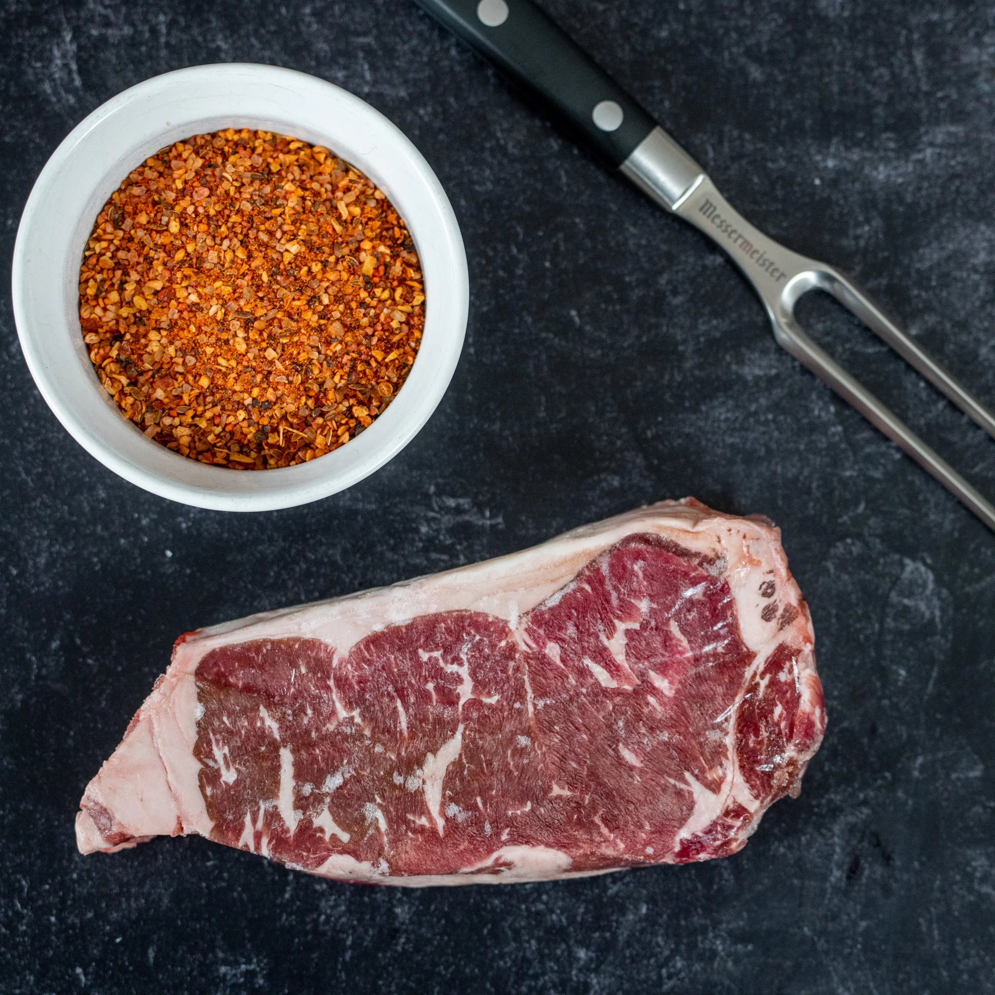 NY Strip Bone In - Black Angus